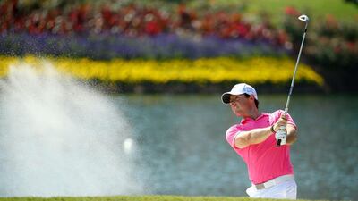 Rory McIlroy wants to be more aggressive on the golf course. Richard Heathcote / AFP