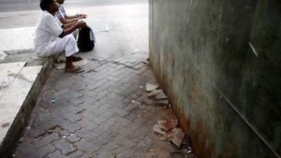 Workers need special chemicals to clean spent paan from building walls and pavements, such as this badly-marked block on Zayed the 1st Street in Abu Dhabi.