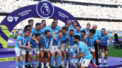 Manchester City captain Ilkay Gundogan celebrates with teammates. Reuters