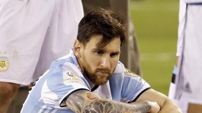 Argentina's Lionel Messi waits for trophy presentations after the Copa America Centenario championship match. Julio Cortez / AP Photo