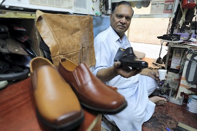 Mohammed Ashiq Ali left Pakistan to make a new life for himself and his family in Dubai 30 years ago. Chris Whiteoak / The National