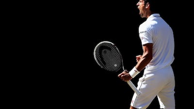 Novak Djokovic celebrates after beating Grigor Dimitrov on Friday to reach the 2014 Wimbledon Championships men's final. Jan Kruger / Getty Images / July 4, 2014