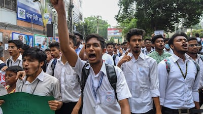 Bangladeshi students march along a a street during a student protest in Dhaka, following the deaths of two college students in a road accident . Parts of the Bangladeshi capital ground to a halt for the seventh day running on August 4, as thousands of students staged protests calling for improvements to road safety after two teenagers were killed by a speeding bus. AFP PHOTO / MUNIR UZ ZAMAN