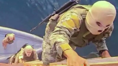 This screen grab taken from undated video footage released by Iran's Revolutionary Guards shows IRGC naval forces allegedly boarding a ship attempting to cross the Strait of Hormuz. AFP