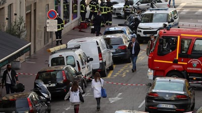 Medical staff and firefighters arrive at the scene. AFP