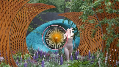 A dancer performs in The David Harber and Savills Garden at the 2018 Chelsea Flower Show in London. All photos by Daniel Leal-Olivas / AFP Photo