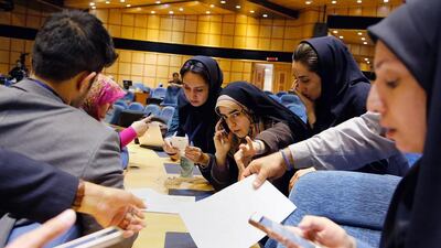 Iranian journalists follow the results of elections for parliament and the Assembly of Experts at the interior ministry in Tehran on February 28, 2016. Abedin Taherkenareh / EPA