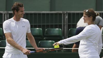 Andy Murray speaks with his coach Amelie Mauresmo on Saturday during practice ahead of the 2015 Wimbledon championship starting on Monday in London. Tim Ireland / AP / June 27, 2015