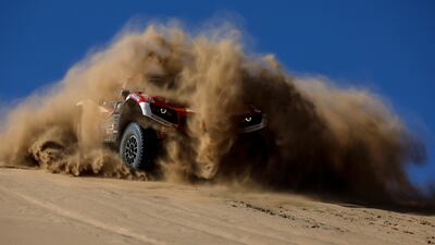 French driver Mathieu Serradori and copilot Loic Minaudier of Srt Racing team during stage 1A of the Rally Dakar between Ha'il and Jeddah, Saudi Arabia, on Saturday, January 1. EPA