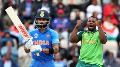 Virat Kohli (6/10): Like Dhawan, captain Kohli played cautiously. The best chance to dismiss the top-order batsman is to do so before he gets his eye in, which is why it was surprising to see him get out after facing 34 balls for his 18. Kohli put in a strong performance all-round: he was sharp on the field, holding on to two catches, and marshalled his team well during South Africa's innings. Aijaz Rahi / AP Photo