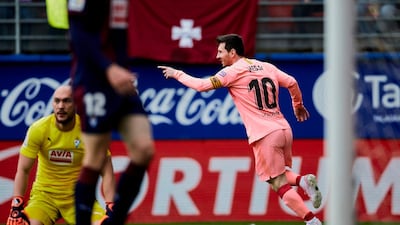 Messi celebrates after scoring against Eibar. AP Photo