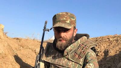 Dubai DJ Joots Krn, real name Karen Balyan (left), in military fatigues while fighting in Nagorno Karabakh. Courtesy: Tiko Balyan