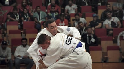 Faisal Al Ketbi grapples with Julian Stonjek of Germany in the 94kg final at the JJIF World Championship at the Mubadala Arena. Courtesy Shivanna Gowda