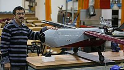 Dr Mohammad Jarrah, a professor of mechanical engineering, shows off an unmanned aircraft.