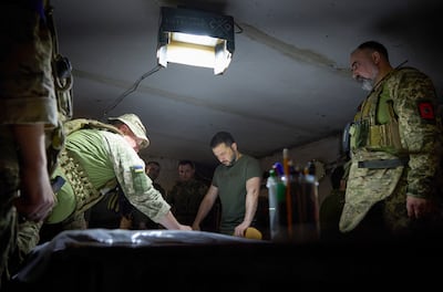 President Volodymyr Zelenskyy met Ukrainian commanders near the front line on Monday. EPA