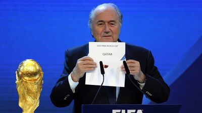 Sepp Blatter reveals Qatar's selection as the 2022 World Cup host nation on December 2, 2010. Walter Bieri / Keystone / AP