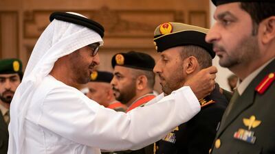 Sheikh Mohamed bin Zayed presents an Emirates Military Medals to members of the UAE Armed Forces, Ministry of Interior and Abu Dhabi Police during a Sea Palace barza.