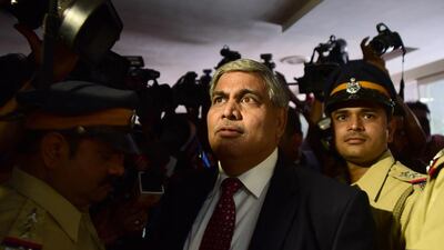 Board of Control for Cricket in India president Shashank Manohar, centre, says the BCCI want the series against Pakistan be played in India. AFP