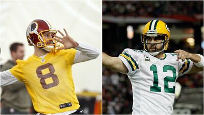 Kirk Cousins, left, has proved this season he can mix it with the likes of Aaron Rodgers, right. Alex Brandon / AP Photo / Kevin C. Cox / Getty Images