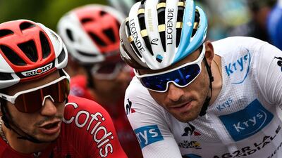 Anthony Turgis, left, and Pierre-Roger Latour of France ride during last stage. AFP