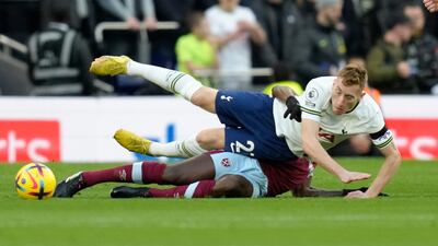 West Ham's Michail Antonio challenges Tottenham's Dejan Kulusevski. AP
