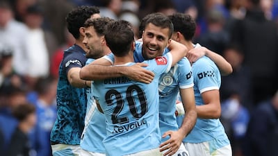 Manchester City players celebrate winning the FA Cup at the Wembley Stadium. AFP