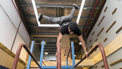 The 23-year-old calisthenics champion Eryc Ortiz trains at Gravity Gym in Quoz. Reem Mohammed/The National
