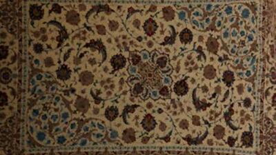 This medium-sized rug contains more than 1,000 knots per square inch, making it shimmer from every angle.