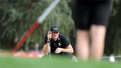 Sebastian Heisele putts on the 17th hole. Chris Whiteoak / The National