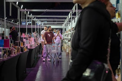 Shoppers browse stock at The Big Clearance Sale, which runs until April 5 at Coca-Cola Arena in Dubai. Antonie Robertson / The National