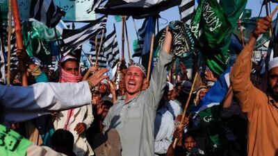 A man shouts slogans during a rally to show support for Pakistan’s blasphemy law in Karachi yesterday.