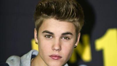 @caption: Justin Bieber spent his first night in Dubai at Movida nightclub. Ronaldo Schemidt / AFP