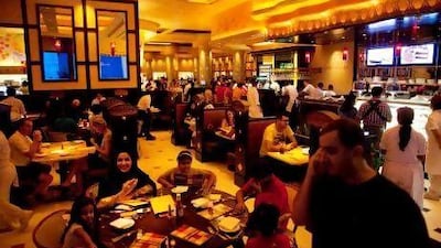 The Dubai Mall branch is serving upwards of 2,000 customers a day. Christopher Pike / The National