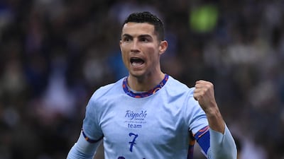 Cristiano Ronaldo celebrates his team's third goal. AFP
