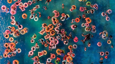 People cool off at a water park in Nanjing, in eastern China's Jiangsu province. AFP