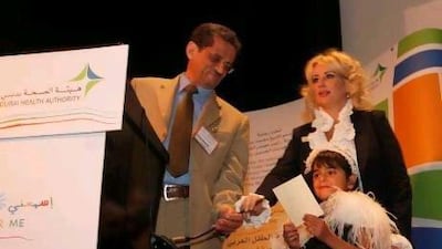 Dubai, 29th February 2012. Maha Ali ( an 8 years old Emirati and a cancer patient ) speaks during the event, as Dr Ziad Al Najjar ( Dubai Health Authority ) and Ms Heba Al Shaar ( Dubai Health Authority ) looks on at the Arab Children Health Congress 2012. ( Jeffrey E Biteng / The National )Cancer sufferer Maha, 8, takes the chance to thank those who have helped with her battle yesterday, as Dr Ziad Al Najjar and Heba Al Shaar, both from the Dubai Health Authority, look on.