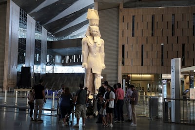 A statue of King Ramses II stands in the museum's main hall. Reuters