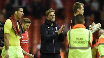 Jurgen Klopp was pleased with Liverpool's Merseyside derby win but has moved to cool expectation. Paul Ellis / AFP