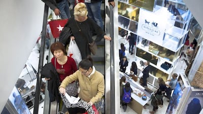 Retailers are adopting strategies to shape perceptions of value and are using technology to transform business models. John Minchillo / AP Photo
