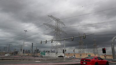 Dark rain clouds over Dubai on Friday. Pawan Singh / The National