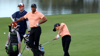 Charlie Woods hits a shot on the 16th hole. AFP
