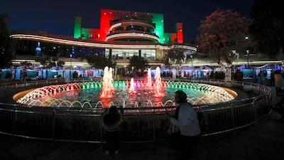 Palestinians visit the Christmas market in the West Bank city of Ramallah, marking the beginning of festive celebrations in the city
