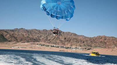 Tourists parasail at the Red Sea resort town of Dahab, 550km east of Cairo in the Sinai Peninsula, Egypt. EPA
