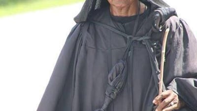 The so-called woman in black is walking across the American South.