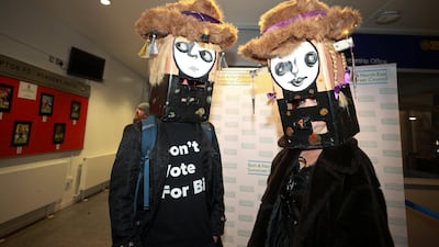 Bill Blockhead, an independent candidate in the running for Bath's MP, and his wife Becky are seen outside a counting centre during Britain's general election, Bath, Britain. Reuters