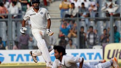 Ravichandran Ashwin, left, scored a century and took nine wickets at Wankhede Stadium.