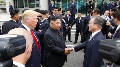 South Korean President Moon Jae-in meets with North Korean leader Kim Jong-un, alongside US President Donald Trump. AFP