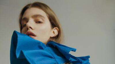 TRUE BLUE: Dress, Dh17,300, Gucci. My Twin ear cuff, Dh27,400; Angel hand cuff, Dh105,000, both from Messika Paris at Ahmed Seddiqi & Sons