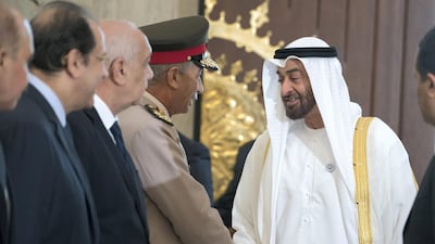 Sheikh Mohamed bin Zayed Al Nahyan greets a guest at the Heliopolis Palace. Mohamed Al Hammadi / Crown Prince Court - Abu Dhabi