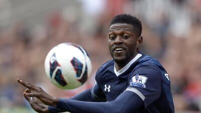 Tottenham Hotspur's Emmanuel Adebayor scored a late goal for Togo during their win in an Africa Cup of Nations qualifier on Sunday, June 14, 2015. AFP PHOTO / ADRIAN DENNIS
